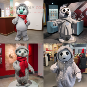 Silver Raspberry mascot costume character dressed with Coat and Scarves