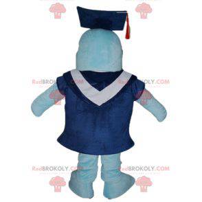 Mascota del delfín azul con bata y gorra de estudiante. -