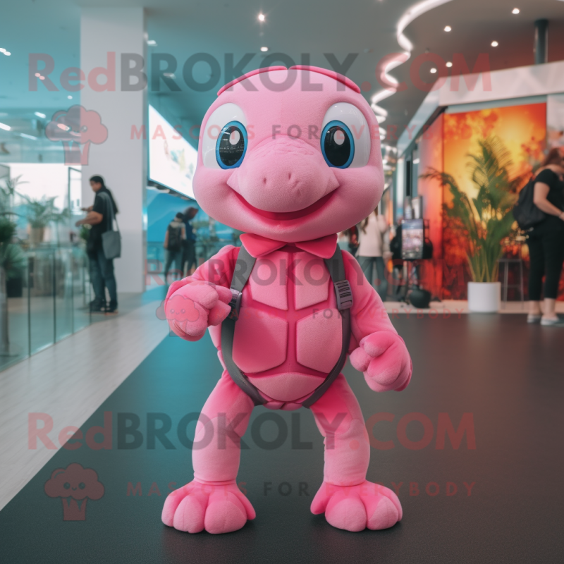 Pink Sea turtle mascot costume character dressed with Culottes and Smartwatches