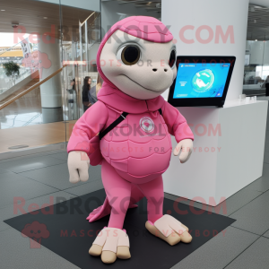 Pink Sea turtle mascot costume character dressed with Culottes and Smartwatches