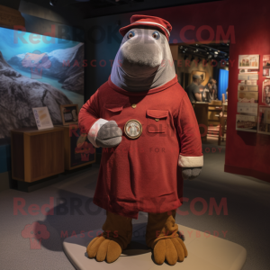 Maroon Walrus mascot costume character dressed with Chambray Shirt and Beanies