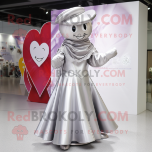 Silver arrow of love mascot costume character dressed with Maxi Dress and Caps