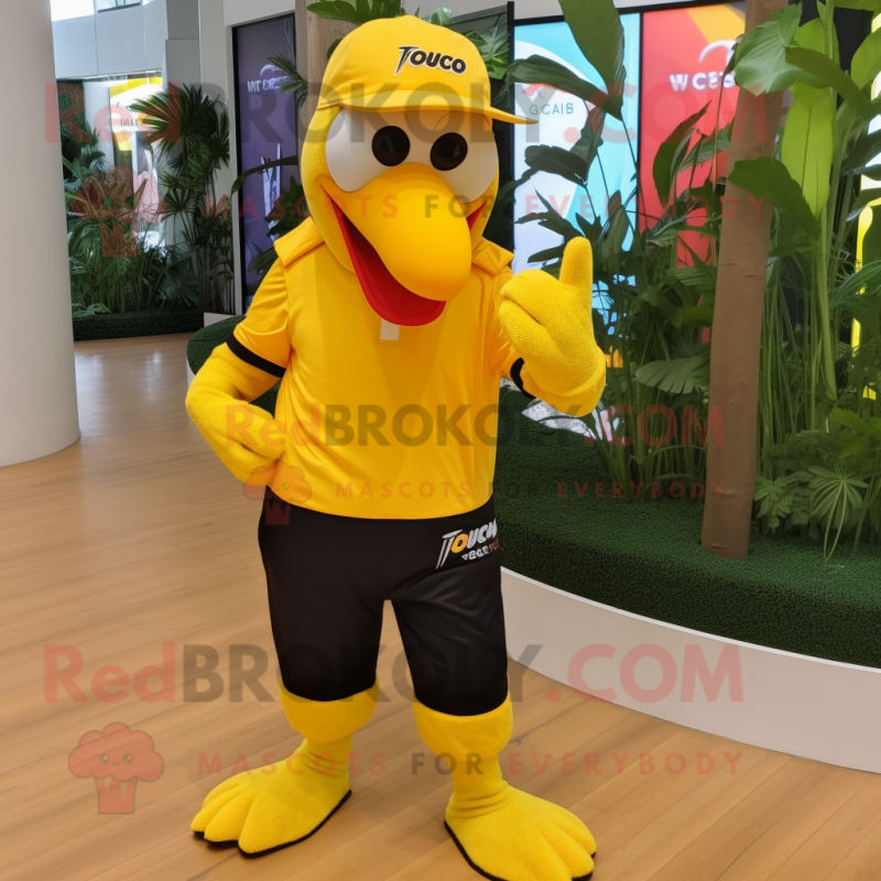 Yellow Toucan mascot costume character dressed with Joggers and Hats