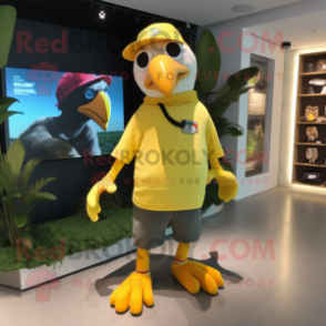 Yellow Toucan mascot costume character dressed with Joggers and Hats