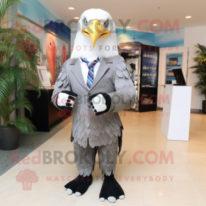 Silver Bald Eagle mascot costume character dressed with Dress and Cufflinks