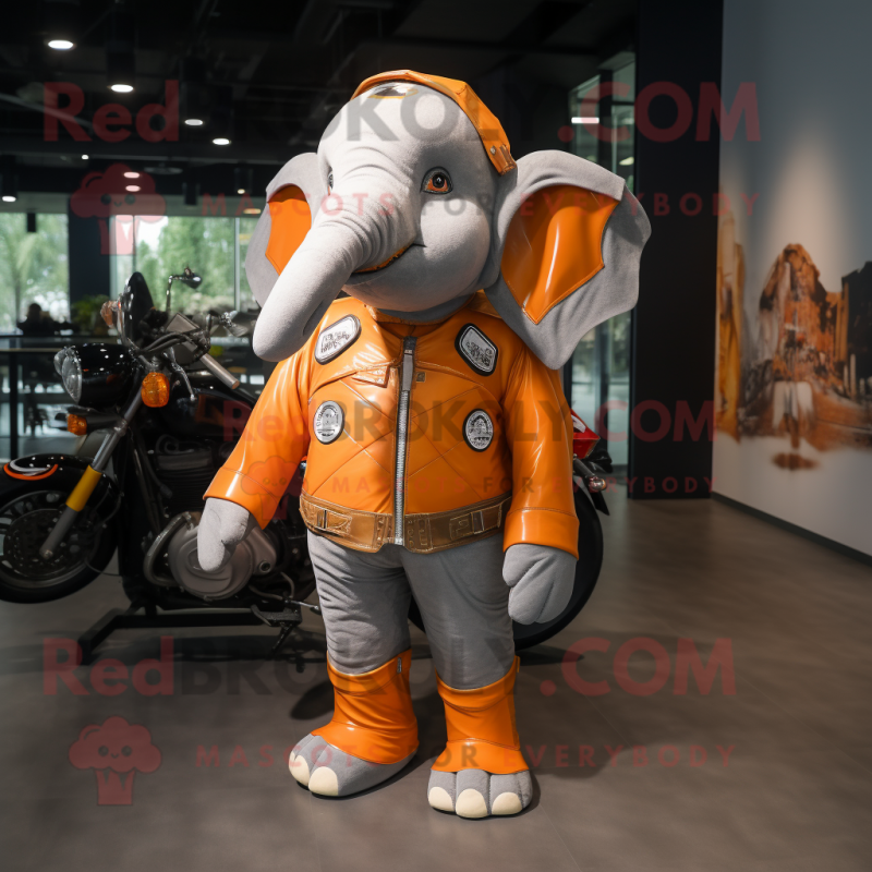 Orange Elephant mascot costume character dressed with Moto Jacket and Backpacks Orange Elephant mascot costume character dressed with Moto Jacket and Backpacks