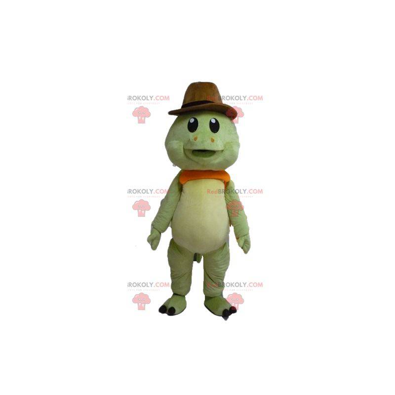 Mascotte de tortue verte et orange avec un chapeau de cow-boy -