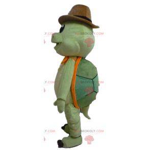 Green and orange turtle mascot with a cowboy hat -