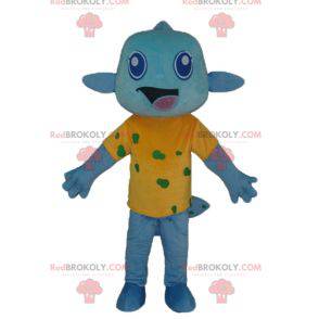 Blue fish mascot with a very smiling yellow t-shirt -