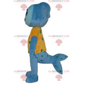 Blue fish mascot with a very smiling yellow t-shirt -