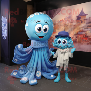 Blue medusa mascot costume character dressed with Boyfriend Jeans and Shawls