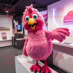 Pink Chicken mascot costume character dressed with T-Shirt and Mittens