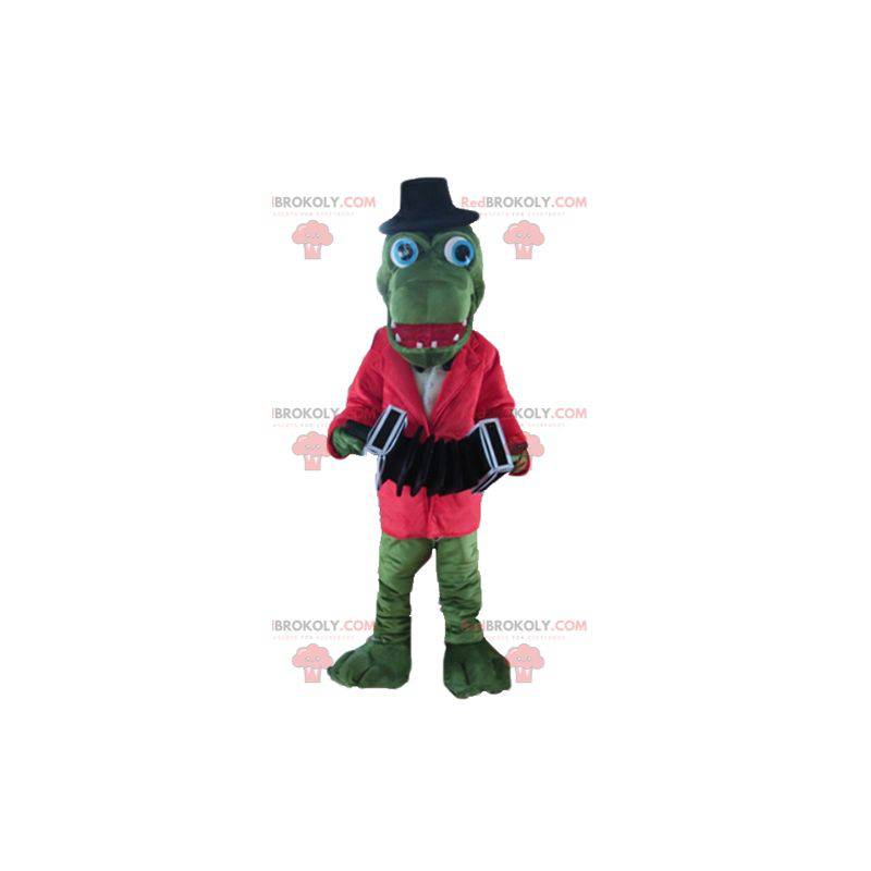 Mascota de cocodrilo verde con una chaqueta roja y un acordeón