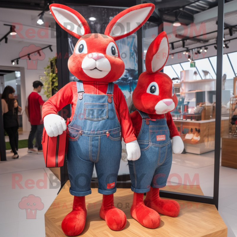 Red Rabbit mascot costume character dressed with Boyfriend Jeans and Wallets