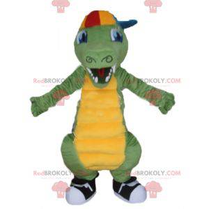 Zelený a žlutý krokodýlí maskot s víčkem - Redbrokoly.com