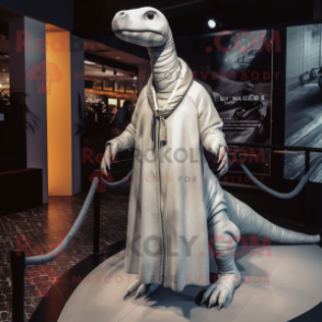 Silver Diplodocus mascot costume character dressed with Coat and Shawl pins