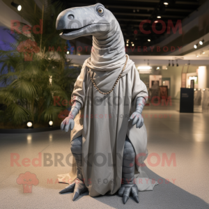 Silver Diplodocus mascot costume character dressed with Coat and Shawl pins