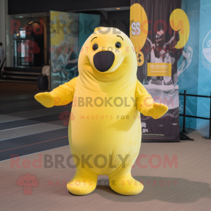 Lemon Yellow Stellar's sea cow mascot costume character dressed with T-Shirt and Gloves