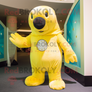 Lemon Yellow Stellar's sea cow mascot costume character dressed with T-Shirt and Gloves