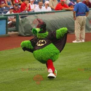 Mascote monstro verde e peludo vestido de Batman -
