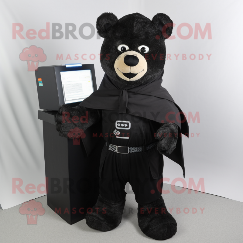 Black computer mascot costume character dressed with Corduroy Pants and Shawl pins