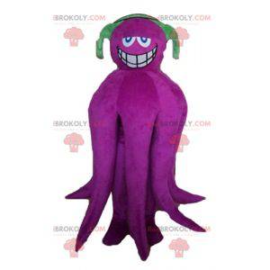 Reusachtige paarse octopus mascotte met koptelefoon -