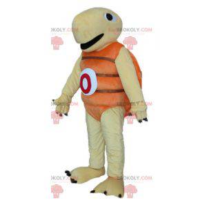 Mascote tartaruga bege e laranja muito jovial e sorridente -