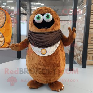 Rust Falafel mascot costume character dressed with Vest and Rings