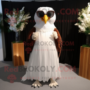 Brown Falcon mascot costume character dressed with Wedding Dress and Sunglasses