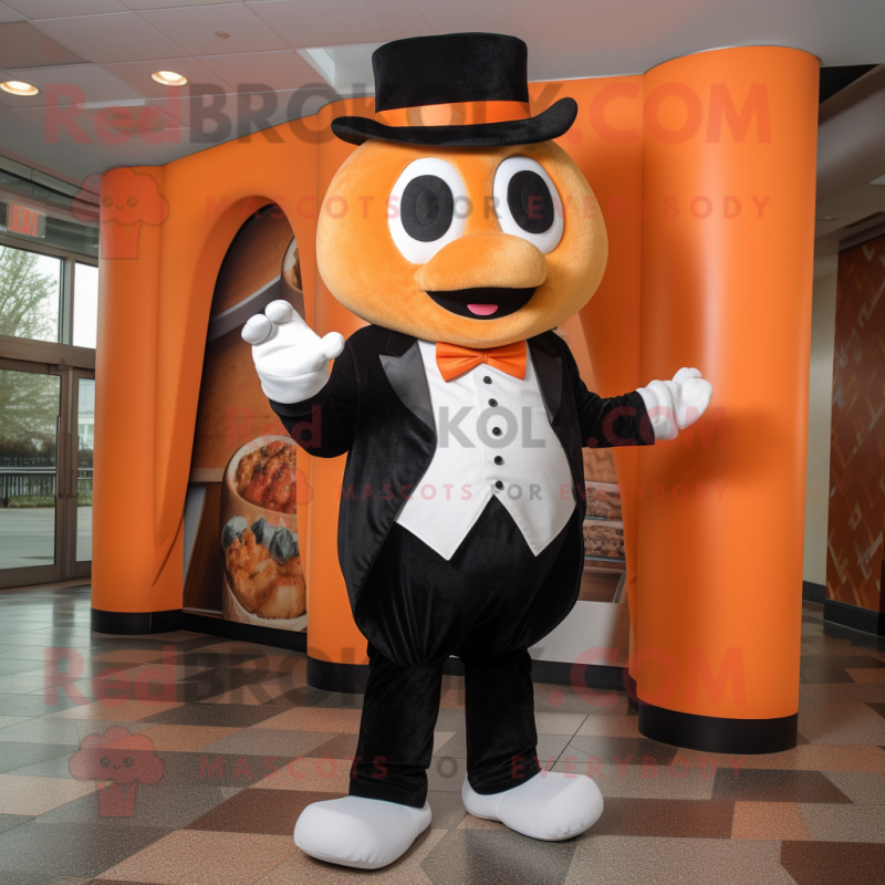 Orange Bagels mascot costume character dressed with Tuxedo and Bow ties Orange Bagels mascot costume character dressed with Tuxedo and Bow ties