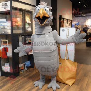 Gray Pheasant mascot costume character dressed with Turtleneck and Tote bags