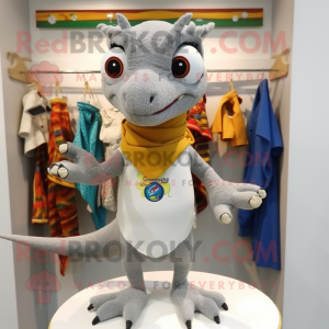 Gray geckos mascot costume character dressed with Polo Tee and Shawl pins