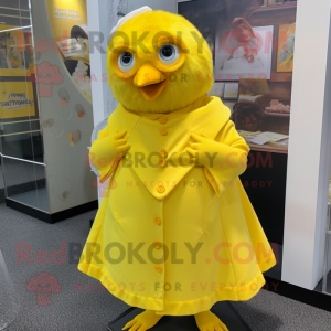 nan Canary mascot costume character dressed with Wrap Dress and Lapel pins