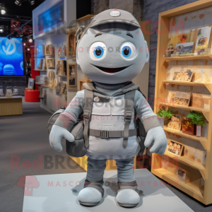 Gray Television mascot costume character dressed with Overalls and Backpacks