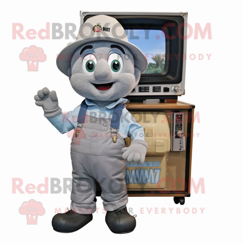 Gray Television mascot costume character dressed with Overalls and Backpacks