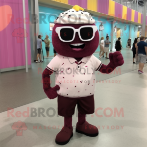 Maroon Cupcake mascot costume character dressed with Shorts and Sunglasses