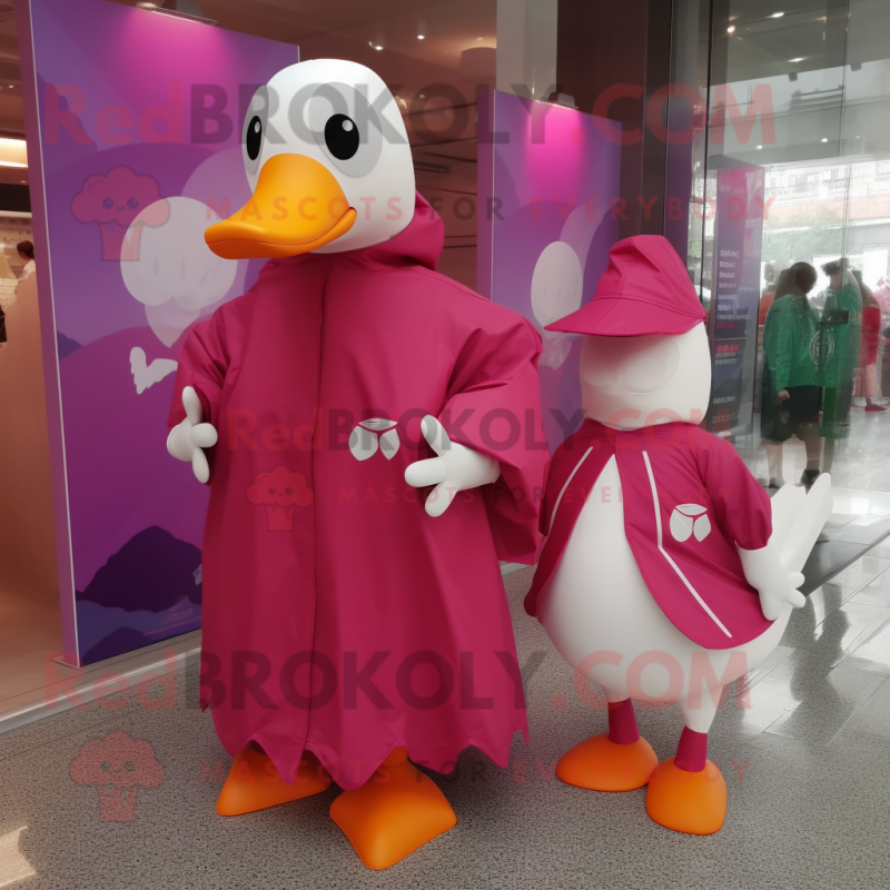 Magenta Swans mascot costume character dressed with Raincoat and Brooches Magenta Swans mascot costume character dressed with Raincoat and Brooches