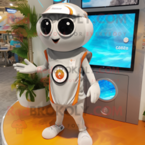 Silver Apricot mascot costume character dressed with Board Shorts and Smartwatches