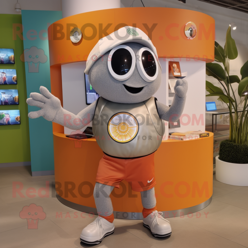 Silver Apricot mascot costume character dressed with Board Shorts and Smartwatches