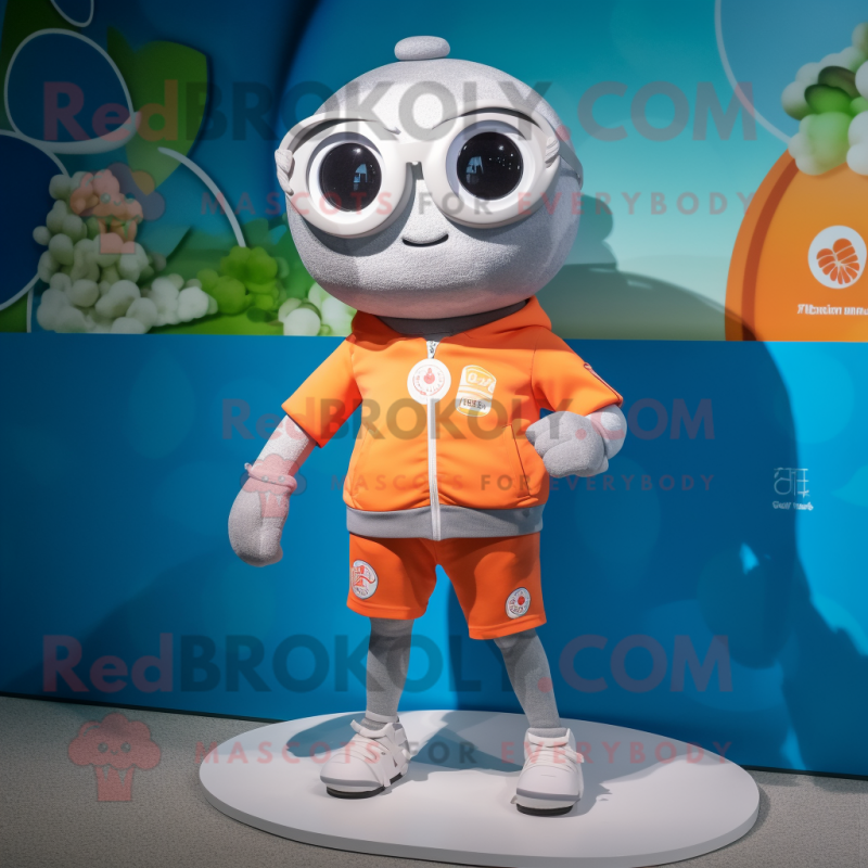 Silver Apricot mascot costume character dressed with Board Shorts and Smartwatches