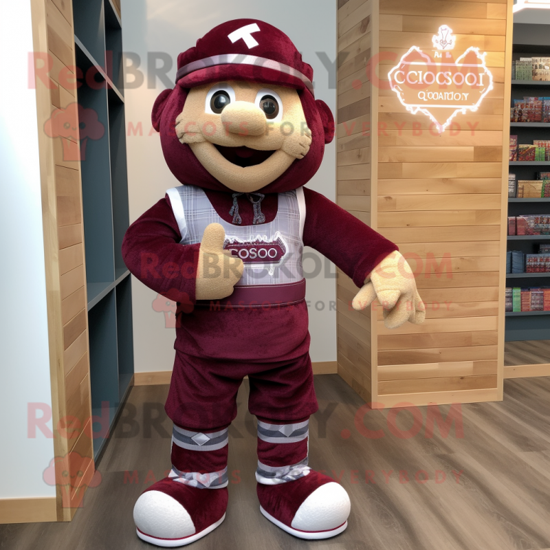 Maroon celtic cross mascot costume character dressed with Jeans and Shoe laces Maroon celtic cross mascot costume character dressed with Jeans and Shoe laces