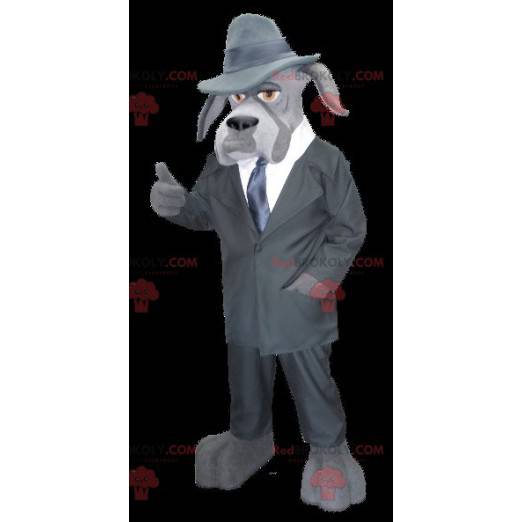 Gray dog mascot dressed as a private investigator -