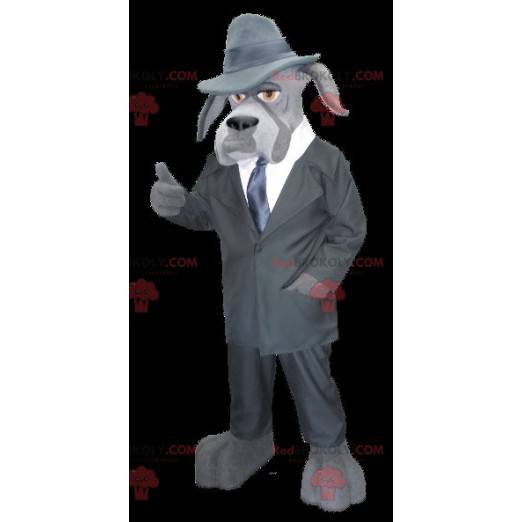 Mascotte de chien gris habillé en détective privé -