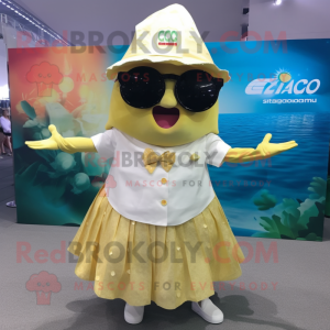 Gold Ceviche mascot costume character dressed with Skirt and Sunglasses