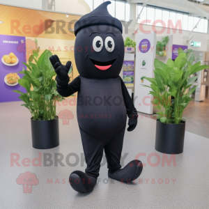 Black Eggplant mascot costume character dressed with Jeans and Berets