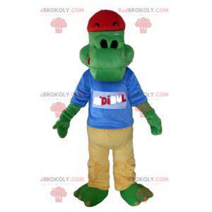 Green crocodile mascot dressed in yellow and blue -