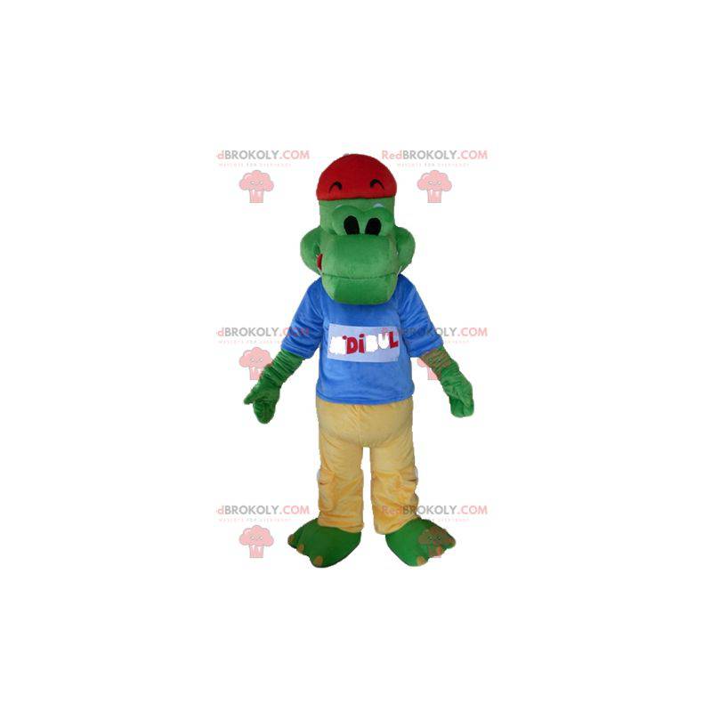 Green crocodile mascot dressed in yellow and blue -