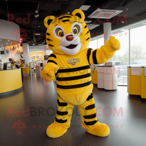 Yellow Tiger mascot costume character dressed with a Jumpsuit and Belts