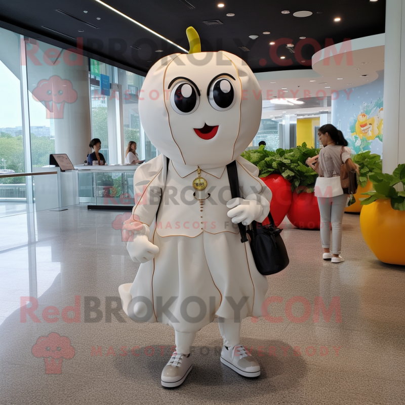 White Tomato mascot costume character dressed with a A-Line Dress and Backpacks