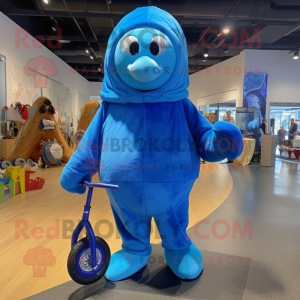 Blue Unicyclist mascot costume character dressed with a Hoodie and Shawls
